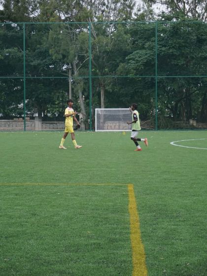 Players spread out during a possession-based drill. We look for intelligent movement and awareness of space.