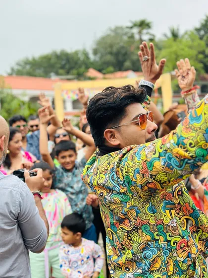 Even when I'm not feeling my best, the show must go on. Here I am, hosting a fantastic pool party for the Doshi and Bhansali families despite having a fever. My commitment is to give my 100% every single time, ensuring the energy never drops and your celebration is a huge success.
