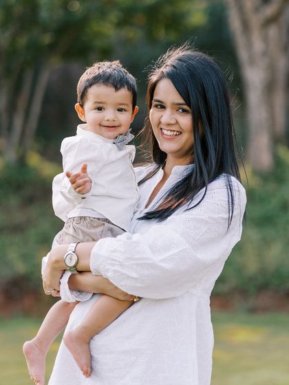 A mother and her happy son during his pre-birthday shoot. Her joyful smile reflects the fun and relaxed atmosphere of our sessions.