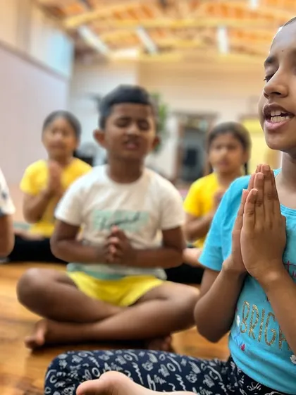 I believe in planting the seeds of yoga and mindfulness at a young age. Here, my young students are learning to use sound and shlokas as a medium for meditation. With discipline and faith, even the most restless child can learn to sit in stillness for many minutes.
