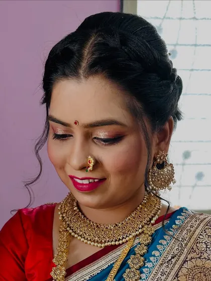 A close-up of the bride's makeup, showing the shimmering eyeshadow and flawless HD base that will last throughout the long wedding ceremony.