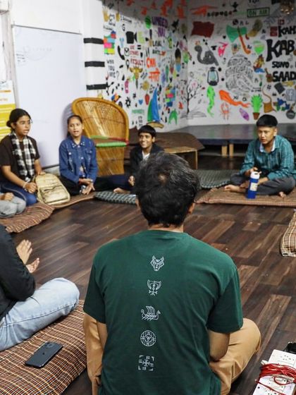 A glimpse into our Hobby Hub classes. This is a vocal session where students sit in a circle with their facilitator, creating an intimate and focused environment for learning.