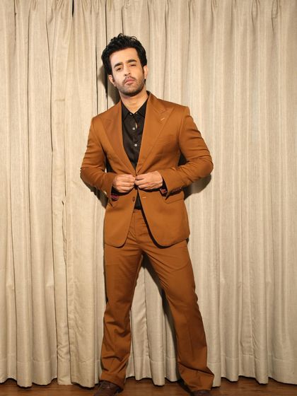 Satyajeet Dubey in our brown formal suit, a look of unmatched elegance and craftsmanship. The precise tailoring and unique details make a bold statement.