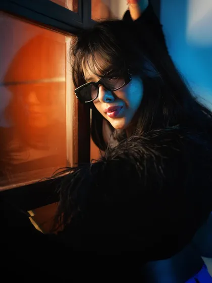 A "Million Dollar Baby" look with a retro vibe. The sunglasses and dramatic lighting create a mysterious and cool aesthetic, showcasing my range for edgier fashion and accessory shoots.