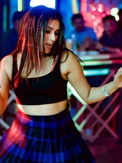 A dancer enjoying the music during a Ladies Night event. The vibe is always on point.