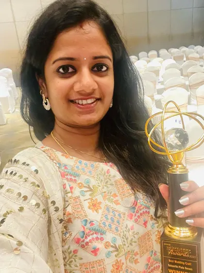 I was so honored and happy to receive the 'Best Wedding Craft' award at the Kovai Business Awards 2022. This recognition is thanks to the trust and support of the thousands of families I've had the pleasure of working with.