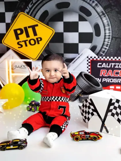 He's number one! This little racer is pointing right at the camera, full of confidence and charm.