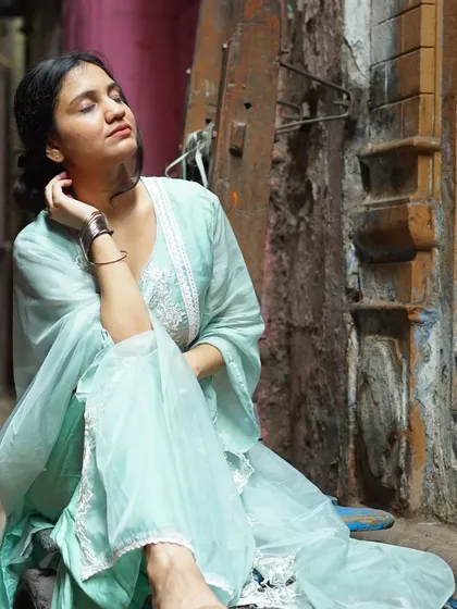 A serene, eyes-closed moment. This type of portrait evokes a sense of peace and contemplation, adding an artistic and emotional layer to the photoshoot.