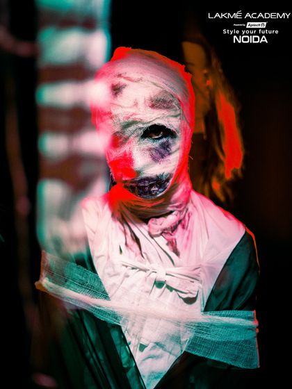 The use of lighting and camera effects enhances the horror of this mummy look, a technique we teach in our portfolio classes.
