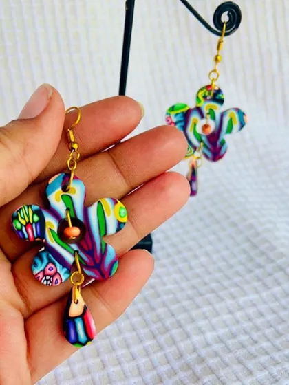 My polymer clay earrings are super lightweight and perfect for adding a pop of color. I handcraft each floral piece and bake it to perfection, so it's both beautiful and durable.