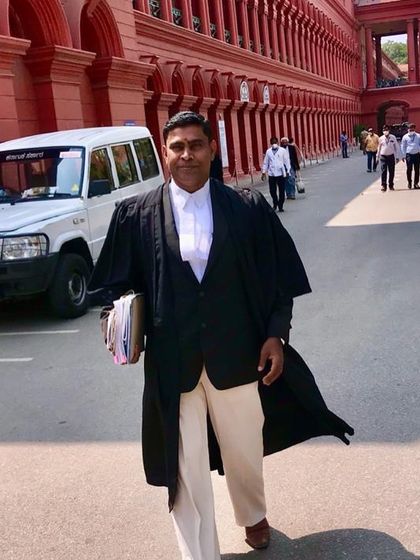 Carrying case files for a court appearance. Each file represents a client whose rights I am dedicated to protecting through the legal system.