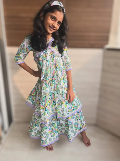 For the little girl who loves to feel a bit fancy, but still needs to be comfy. This tiered dress with a whimsical butterfly print is made from lightweight cotton, so it’s perfect for twirling at a party or just playing at home.