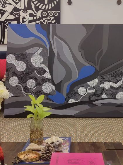 The 'Cognizance' painting in my studio, a piece that translates the memory of a night sky into abstract shapes and textures, including mosaic-like patterns.