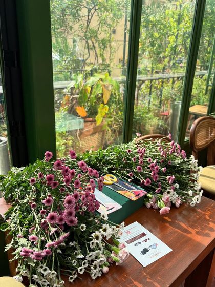 Bouquets of fresh flowers ready for our tablescaping workshop. We provide all the materials you need to learn about floral arrangements, color theory, and how to create stunning centerpieces.