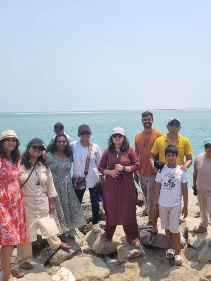The group posing at Arichal Munai in Dhanushkodi, the very last point of India, where the Bay of Bengal and the Indian Ocean meet.