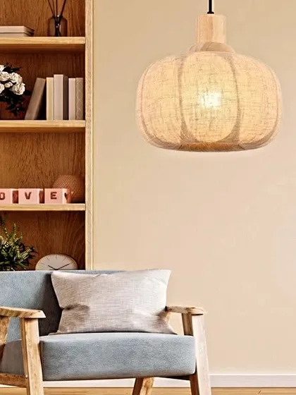 A slightly smaller version of our wood-made hanging light, this piece is perfect for smaller spaces or for hanging in clusters. The natural materials and warm light create a serene and inviting ambiance.