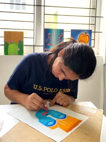 This student is learning to blend colors with oil pastels in one of our short-term courses. These courses are designed to be fun and pressure-free.