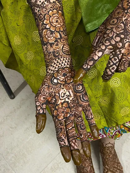Another angle showing the name and the intricate floral work.