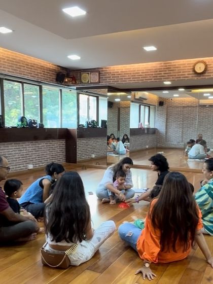 Passing games are more than just fun. They build crucial skills like attention, coordination, and timing, all while the children are simply enjoying a song together in the circle.