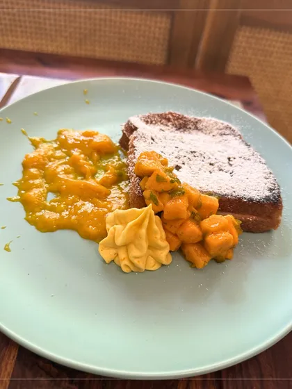 Celebrating mango season with my special Mango French Toast. It's served with a fresh mango compote, mango salsa, and a dollop of vegan whipped cream for a taste of summer.