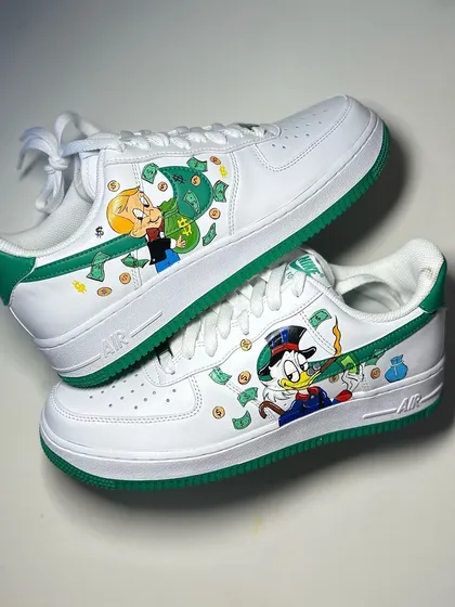 Who doesn't love a bit of Richie Rich and Scrooge McDuck? I painted these classic characters on a pair of clean white Air Force 1s, complete with money bags and flying cash. The green accents on the sole tie it all together.