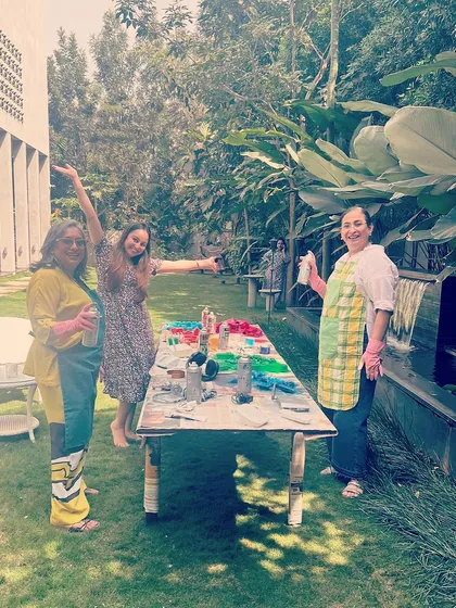 Here is our team of women artists working together outdoors to restore an upcycled mural. This project, made from electronic waste and discarded items, shows how collaborative art can transform forgotten materials into a public statement.