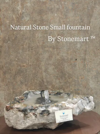 This small natural stone fountain is perfect for those who want a water feature without a large footprint. It's hand-carved to preserve the stone's unique character.