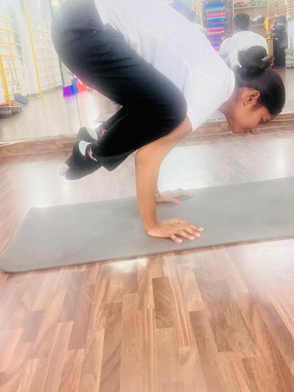 Building arm strength with Bakasana, the crow pose. This is often the first arm balance yogis learn, and it's a huge confidence booster.