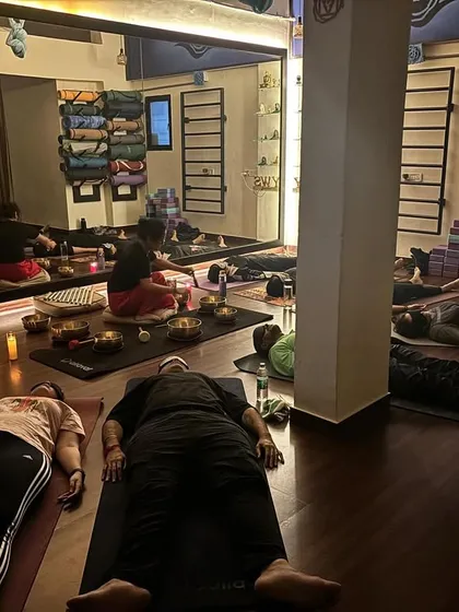 This is a moment from one of our Naada Yoga sessions. Students rest in Savasana, absorbing the healing vibrations of Tibetan singing bowls. It's a practice of deep surrender and rejuvenation for the mind and body.