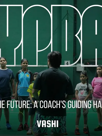 Mentoring the future at our Vashi center. A coach's guiding hand is essential in shaping a player's career.