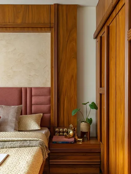 A detail shot of the master bedroom, showcasing the warmth and comfort of the wooden flooring and beige color palette.