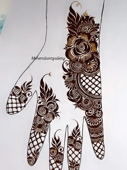 This is a complete bridal mehendi design layout practiced on paper. My advanced students learn how to plan and execute such full-coverage patterns, combining floral motifs, intricate netting (jaali), and finger details into a stunning, cohesive piece.