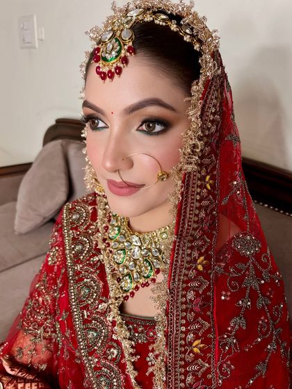 A close-up of this regal bridal look. The combination of the detailed jewelry and the soft yet defined makeup created a truly timeless feel.