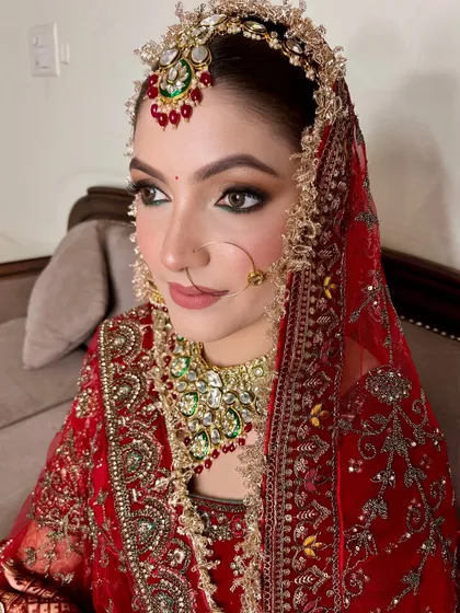 A close-up of this regal bridal look. The combination of the detailed jewelry and the soft yet defined makeup created a truly timeless feel.
