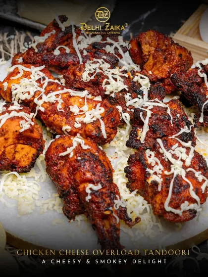 Presenting our Chicken Cheese Overload Tandoori. We take juicy, smoky tandoori chicken and drench it in a generous layer of molten cheese. This is pure indulgence, a cheesy and smoky delight that's become a crowd favorite.