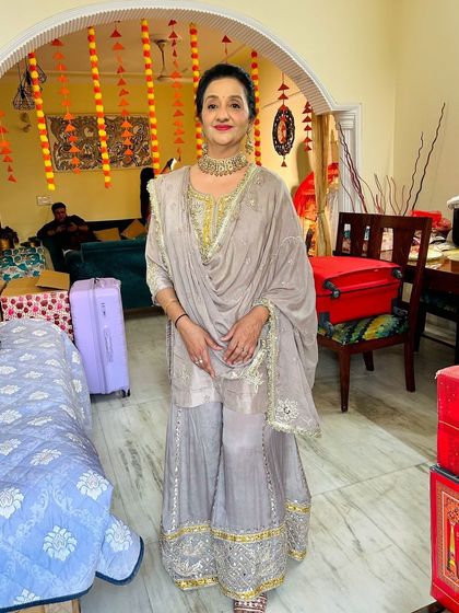 Another full-length view, showing how the makeup and outfit create a cohesive and stylish look.