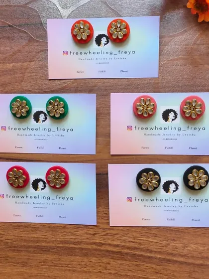These floral studs are another great option for office or daily wear. They are available in many colors, including red, green, pink, and black, and can be customized.