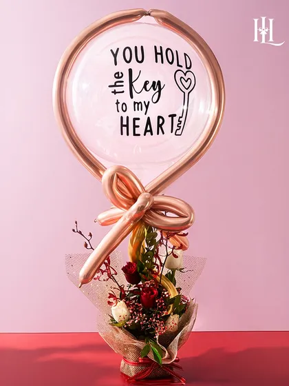 A close-up of the "You Hold the Key to my Heart" balloon and bouquet, a perfect romantic gift for your Valentine.