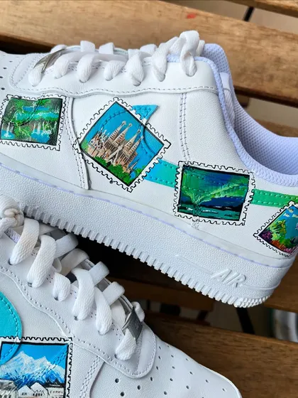 For the world traveler. These "Stamp Force 1s" feature tiny, detailed hand-painted stamps of famous landmarks and natural wonders from around the globe.