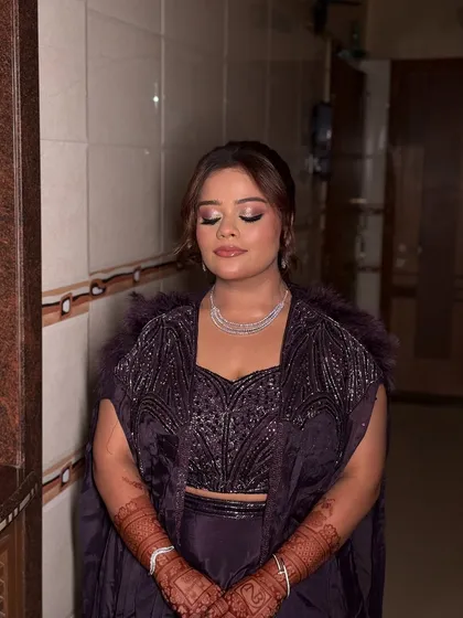 More shots of my sister Bhavisha looking absolutely radiant for her Roka. The purple outfit was complemented by a soft glam makeup look with shimmery eyes and a pretty pink lip.