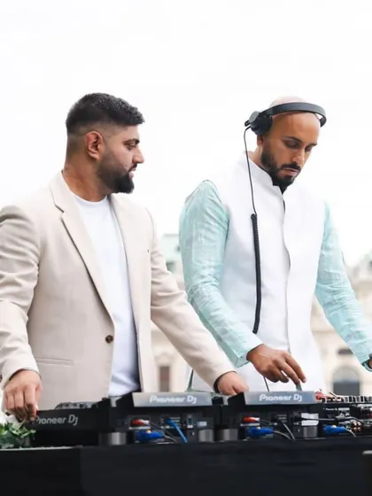 A shot with my DJ partner Itch in Vienna. August was a whirlwind of destination weddings, UK gigs, and family time.