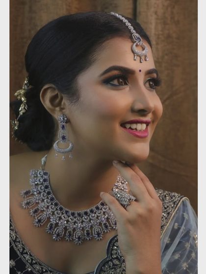 Another angle of the modern reception look, showing how the necklace and earrings sparkle. This set is a popular rental for evening events.