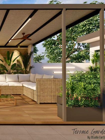 This 3D visualization showcases a large L-shaped sofa under a pergola, surrounded by built-in planters. It helps clients envision how they can have a comfortable, green, and stylish sanctuary in their own home.