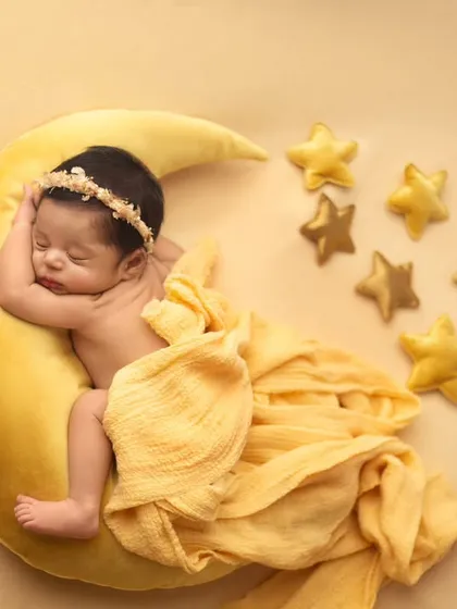 Let me create a little magic for your baby. This celestial moon and stars setup is one of my most requested themes, perfect for capturing your little one's dreamy start in the world.