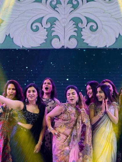 The ladies of the family having the time of their lives during their group performance.