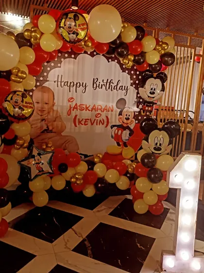 Another angle of the Mickey Mouse setup, showing the full balloon arch and character stands. I ensure the decor looks great from every viewpoint, perfect for photos.