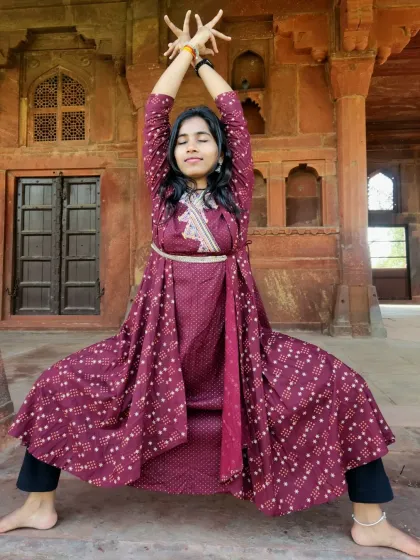 Embodying the strength and grace of the Goddess. This is Deviasana, or Goddess Pose, a powerful stance that opens the hips and strengthens the legs. A perfect pose to connect with your inner shakti.