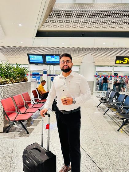 At the airport, ready for the next destination. They say law is a jealous mistress, demanding unwavering dedication. It's a life of constant travel and commitment.