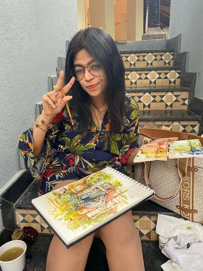 Doing a quick sketch in a gorgeous property. This is me, finding a quiet corner to capture the beauty of the place in my sketchbook.