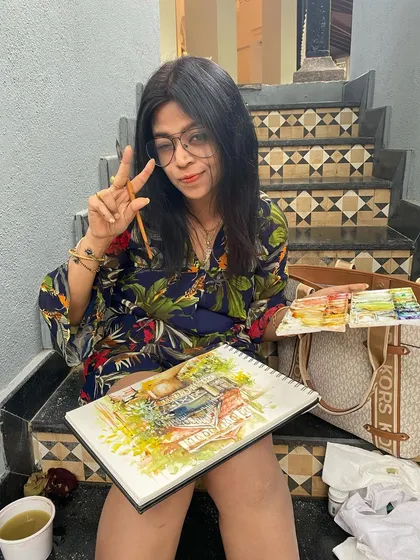 Me taking a moment to sketch during a vacation. I couldn't resist capturing the beautiful vintage-style architecture of the property we were staying at.